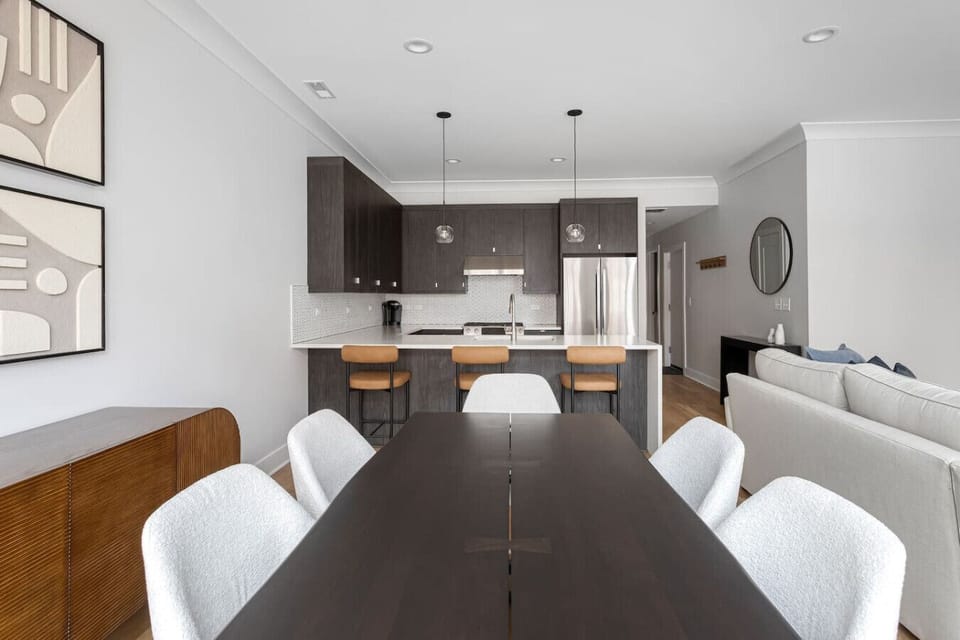 Dedicated Dining area. 80` dining table provides seating for 6 as well as bar seating for 3!