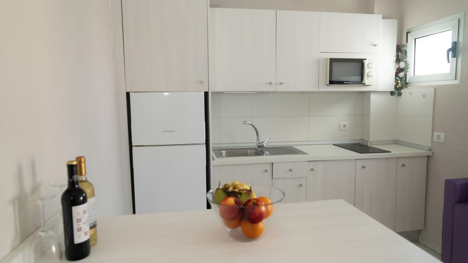 Apartment, Balcony, Resort View | Private kitchen | Fridge, microwave, stovetop, electric kettle