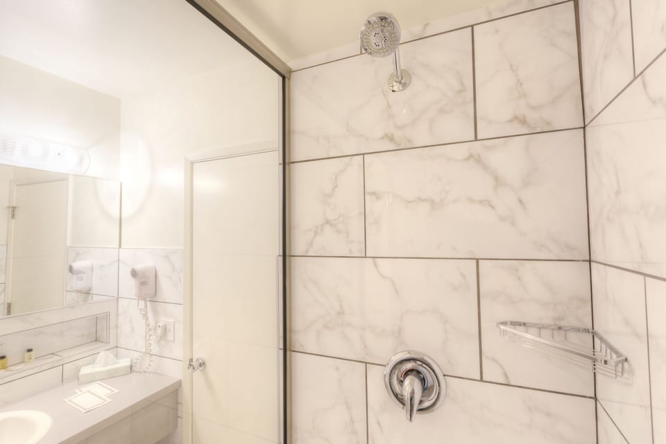 Shower, free toiletries, hair dryer, towels