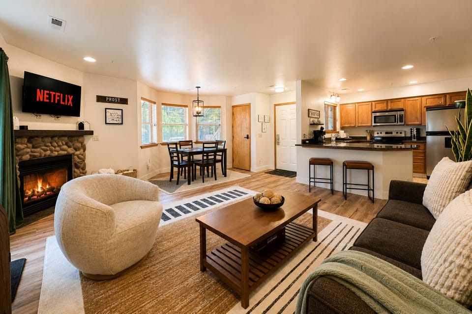 Cozy living space with propane fireplace, air conditioning,