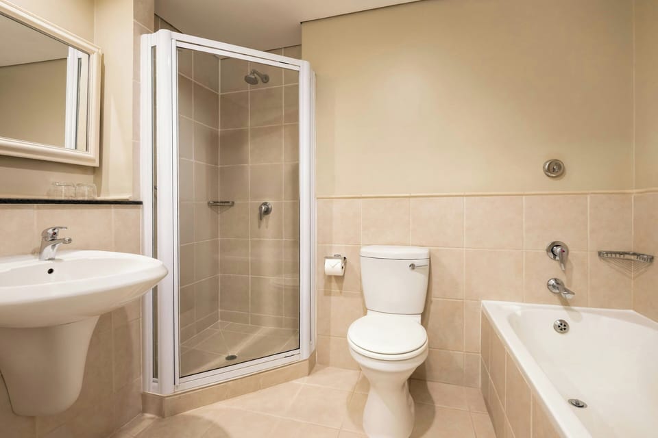 Separate tub and shower, free toiletries, hair dryer, towels
