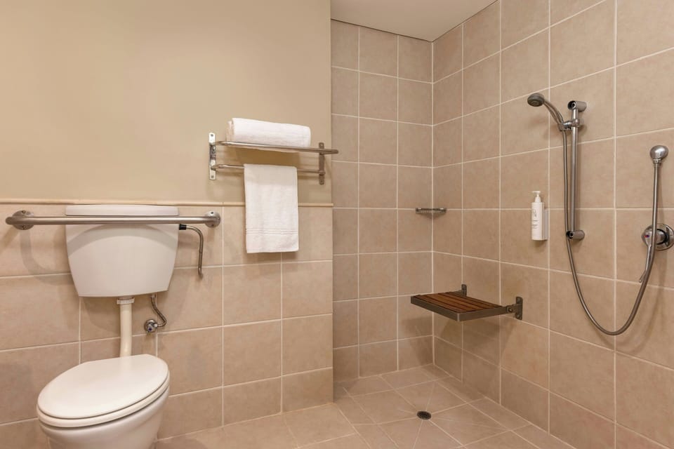 Family Room, 2 Double Beds | Bathroom | Separate tub and shower, free toiletries, hair dryer, towels