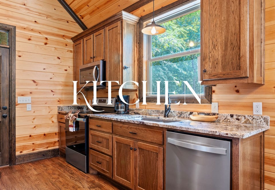 With rich wood cabinetry, granite counters, and stainless steel appliances, this kitchen is fully equipped and ready for anything from pancakes to pasta.