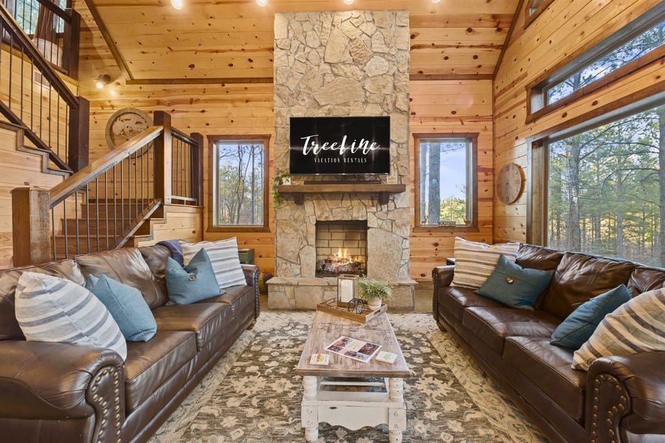 Gather with loved ones in this cozy living space with plenty of natural light.