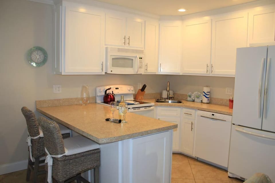 House, 1 King Bed (Capri by the Gulf 102) | Private kitchen | Oven, toaster