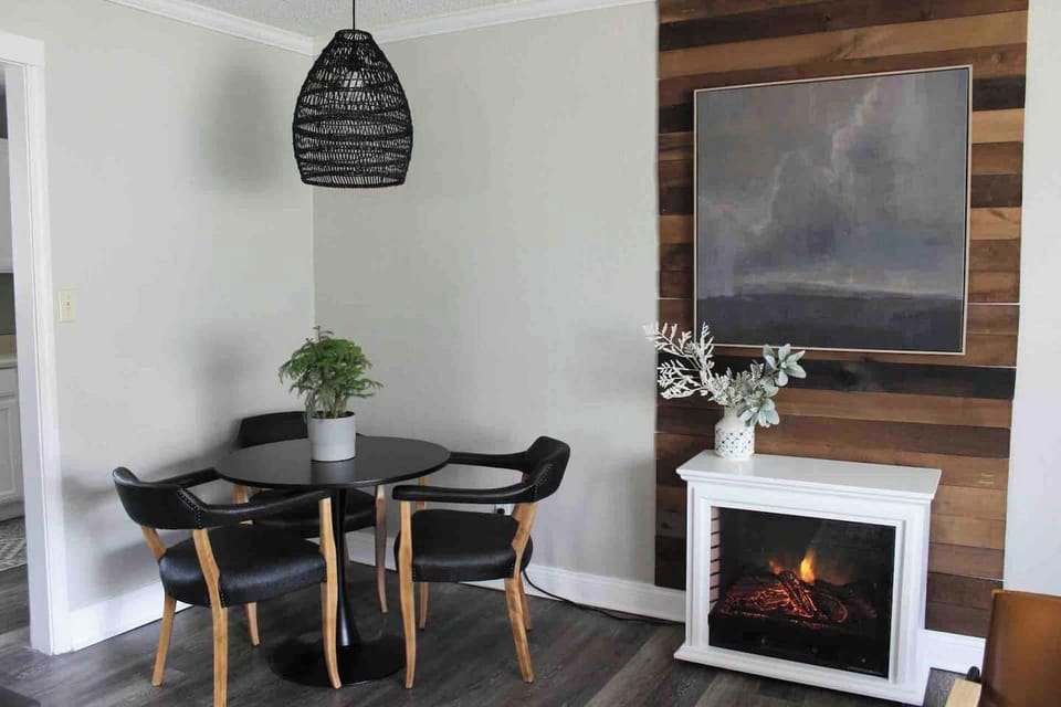 Dining nook with seating for 3. 
High chair available in garage.

Electric fireplace for cozy ambiance. Can run with or without heat on those colder days.