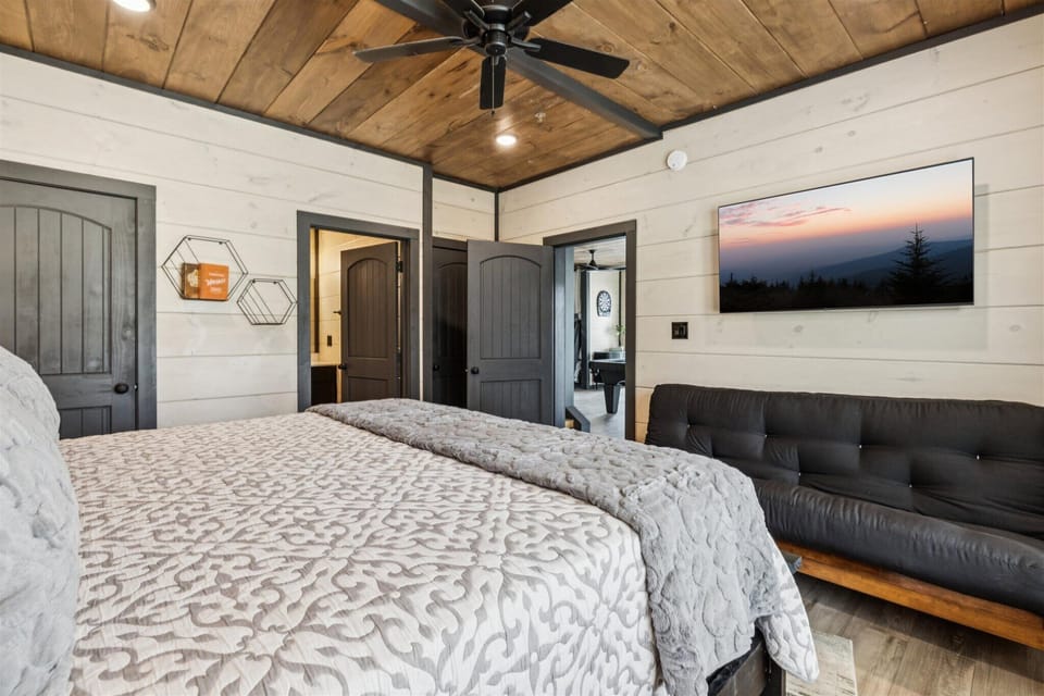 Queen Suite — Lower Level, Suite 5, Private Ensuite Bath, Smart TV, Direct Pool Level Access