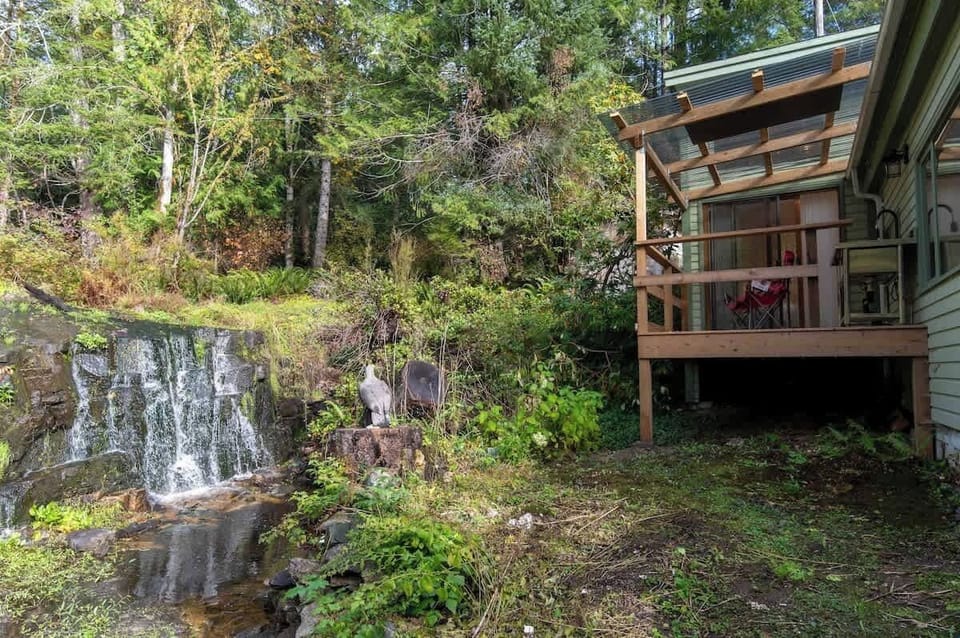 Bask in views of a nearby waterfall, a serene backdrop for a peaceful getaway.