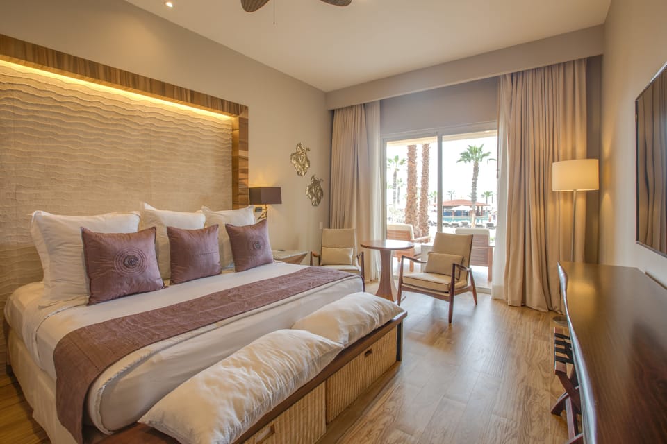 Premium bedding, down comforters, pillowtop beds, free minibar