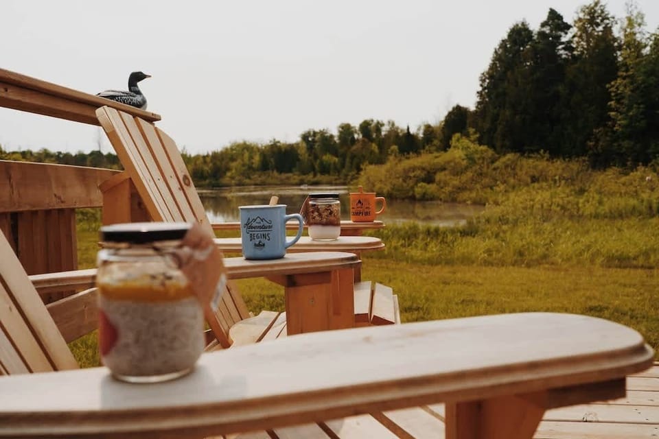Lakeside morning at a glamping site.