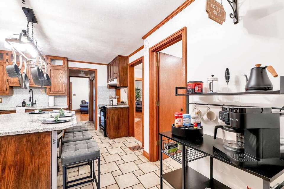 Well-stocked kitchen with bar