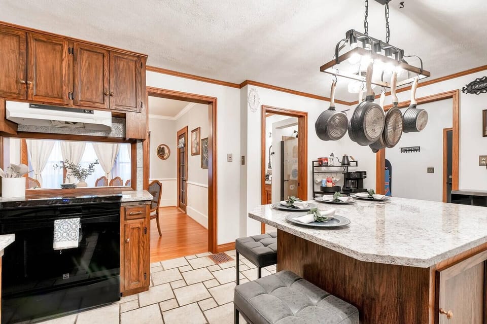 Well-stocked kitchen with bar