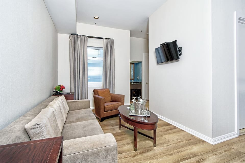 Relax on the plush sofa with drinks and easy TV time.