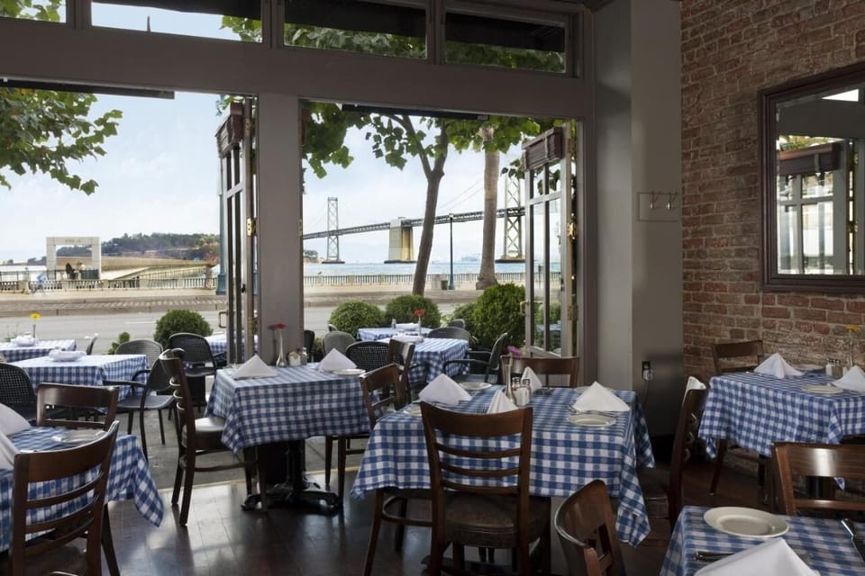 Savor waterfront dining while gazing at the iconic bridge.