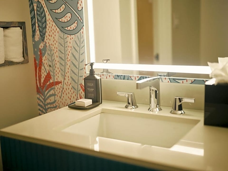 Refresh at the bright vanity with spa-like glow.