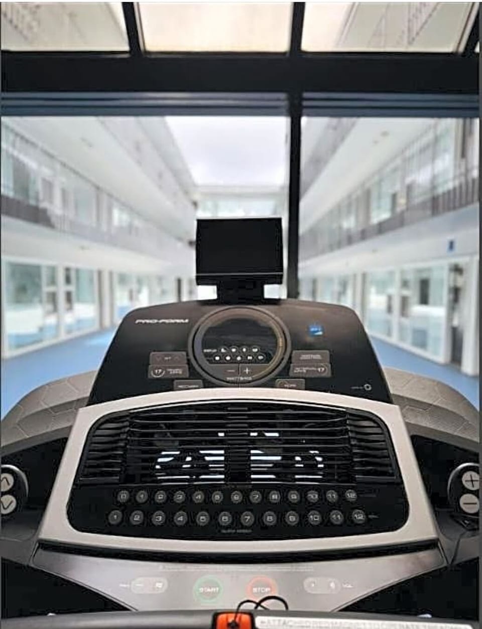 Recharge with an energizing workout in the bright fitness room.