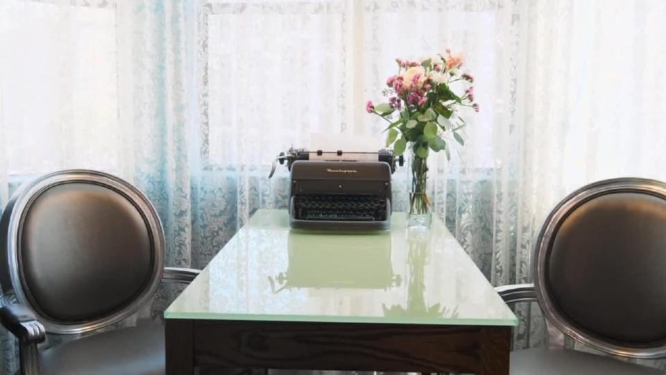 Sip coffee and jot notes at this charming window table.