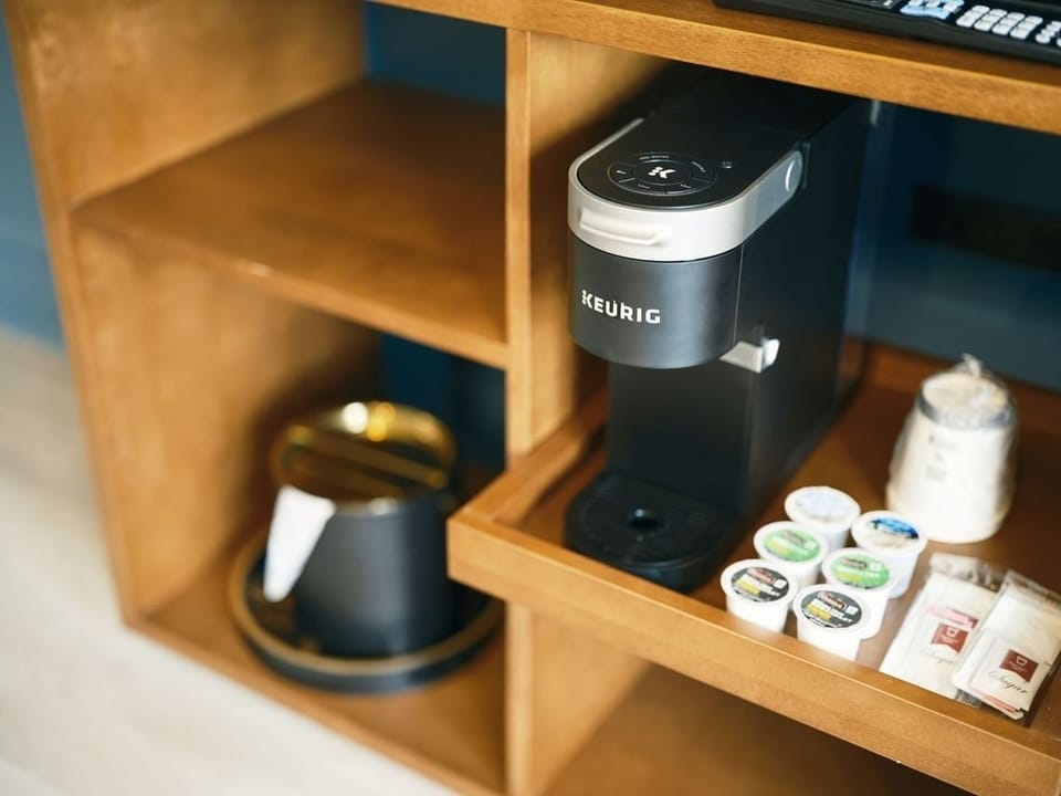 Wake up gently with fresh in-room coffee and tea essentials.