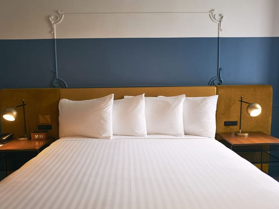 Sink into plush pillows and drift off in total comfort.