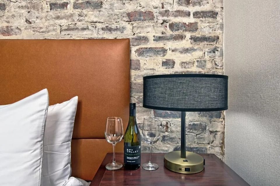 Toast to your getaway with bedside ambiance and boutique style.