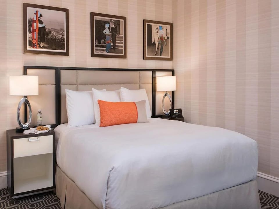 Drift off fast in a serene king bed with bedside glow.