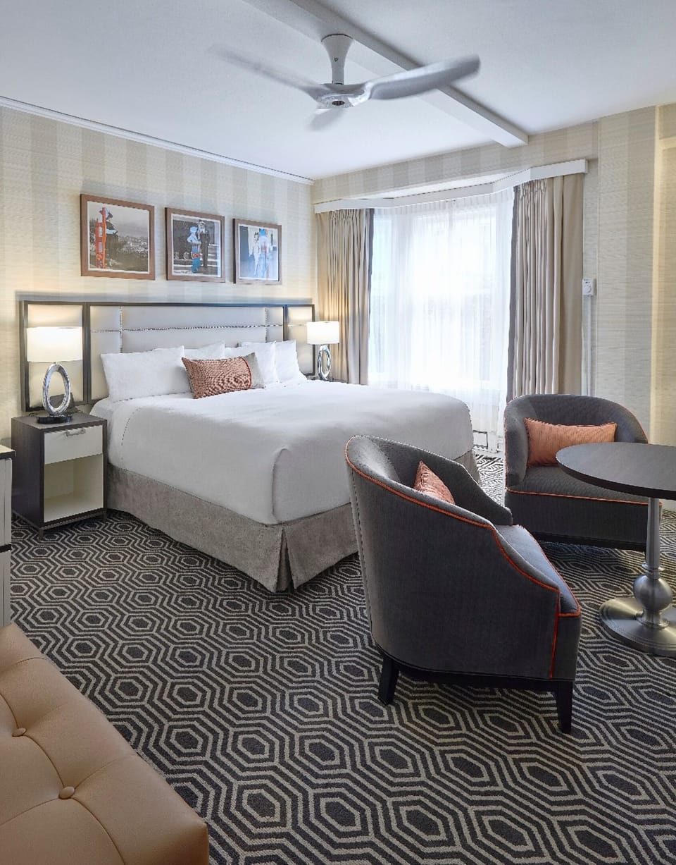 Unwind in a bright, spacious room with plush king bed.