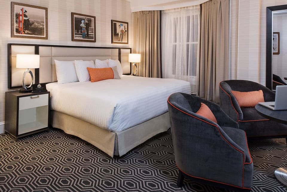 Sink into crisp linens, then lounge with a late-night drink.