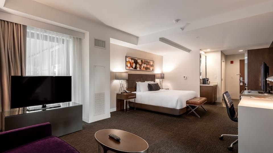 Spread out in a spacious double-room with city-light views.