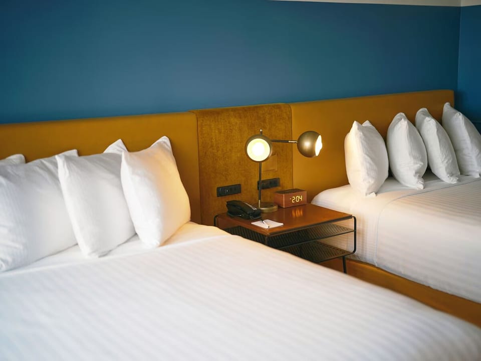 Tuck in under smooth linens and enjoy a quiet night’s sleep.