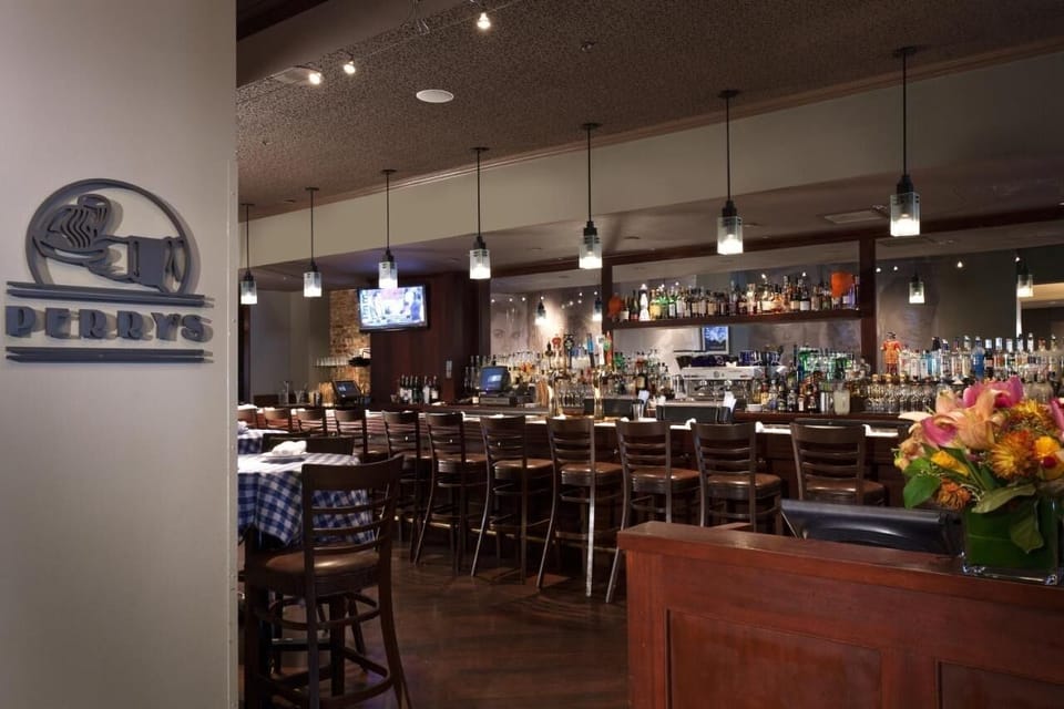 Start the evening with appetizers and drinks at the bustling bar.