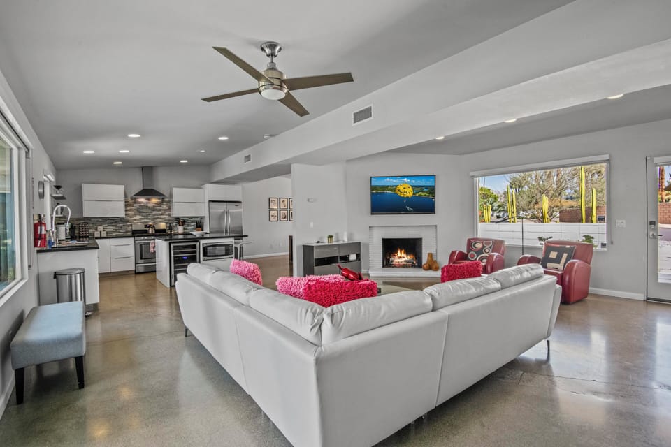 Spacious great room with designer furnishings and indoor-outdoor flow