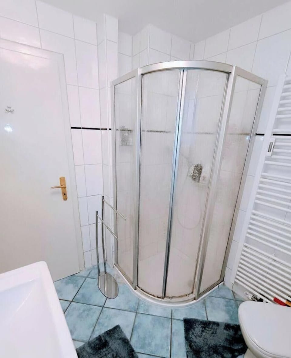 Bathroom is on the first floor, outside the apartment.