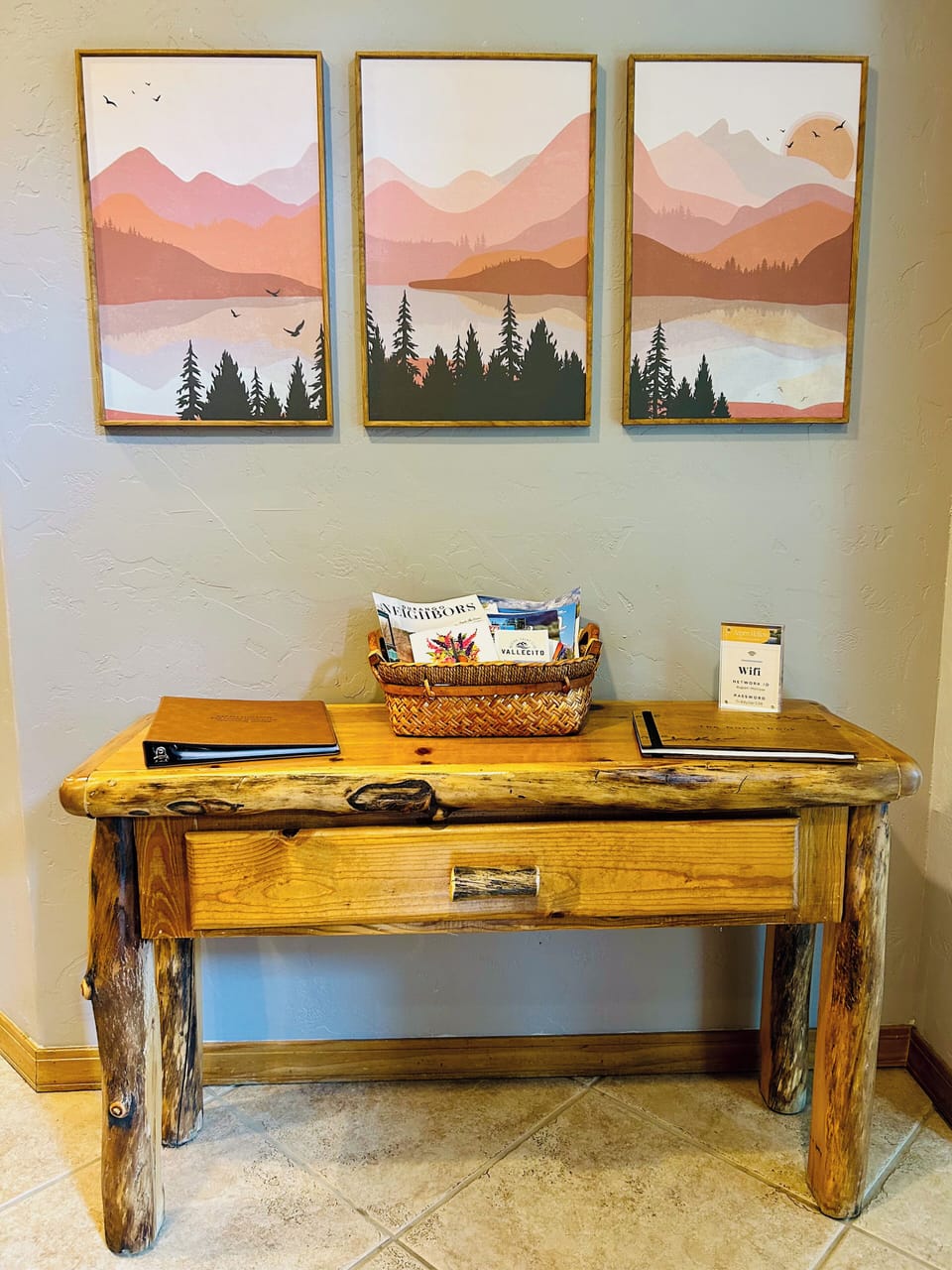Front entry with welcome guide, local activity information and guest book.