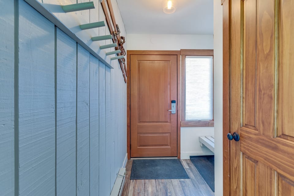Entryway with bench, hooks and cubbies