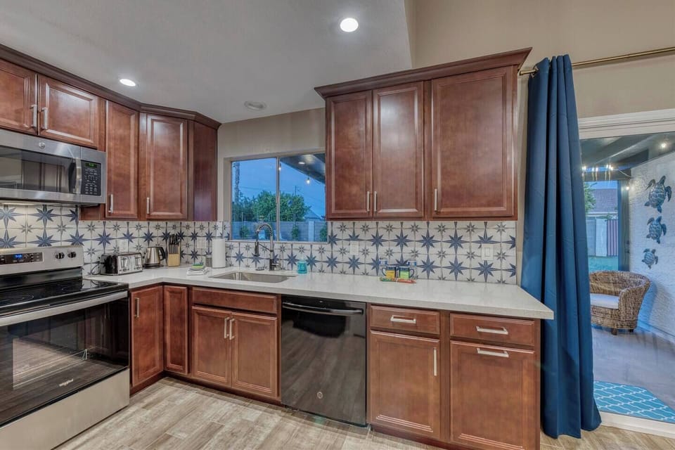 Open Kitchen with Quartz countertops and full size appliances