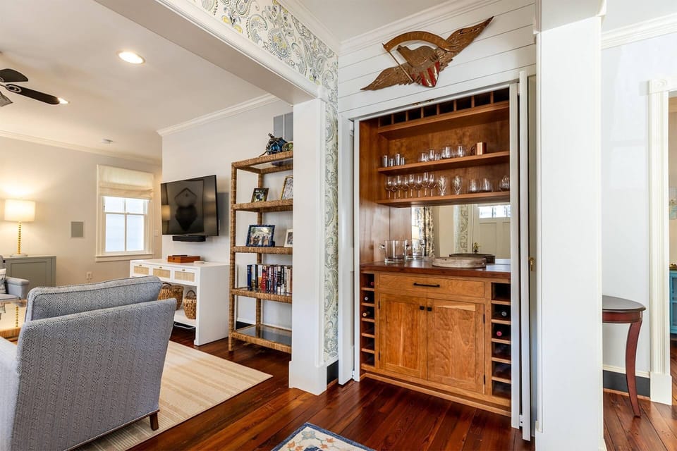 Through the Living Room is the foyer and built-in bar.