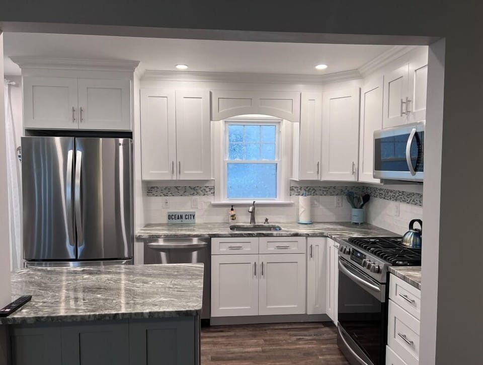 Remodeled kitchen with clean, coastal style.