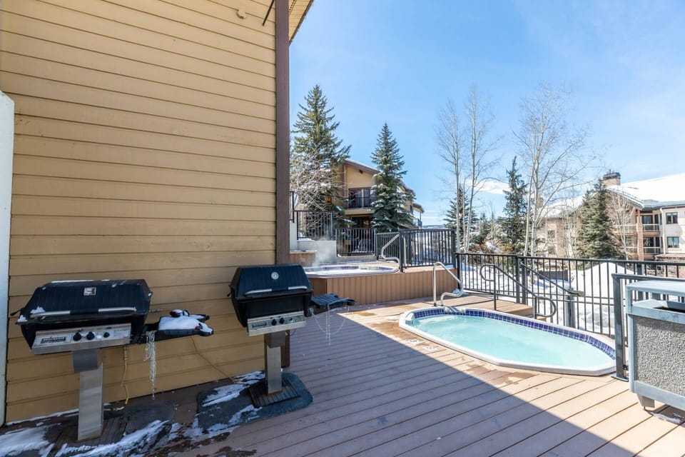Enjoy community amenities by relaxing in the hot tub or grilling after a day of adventure!