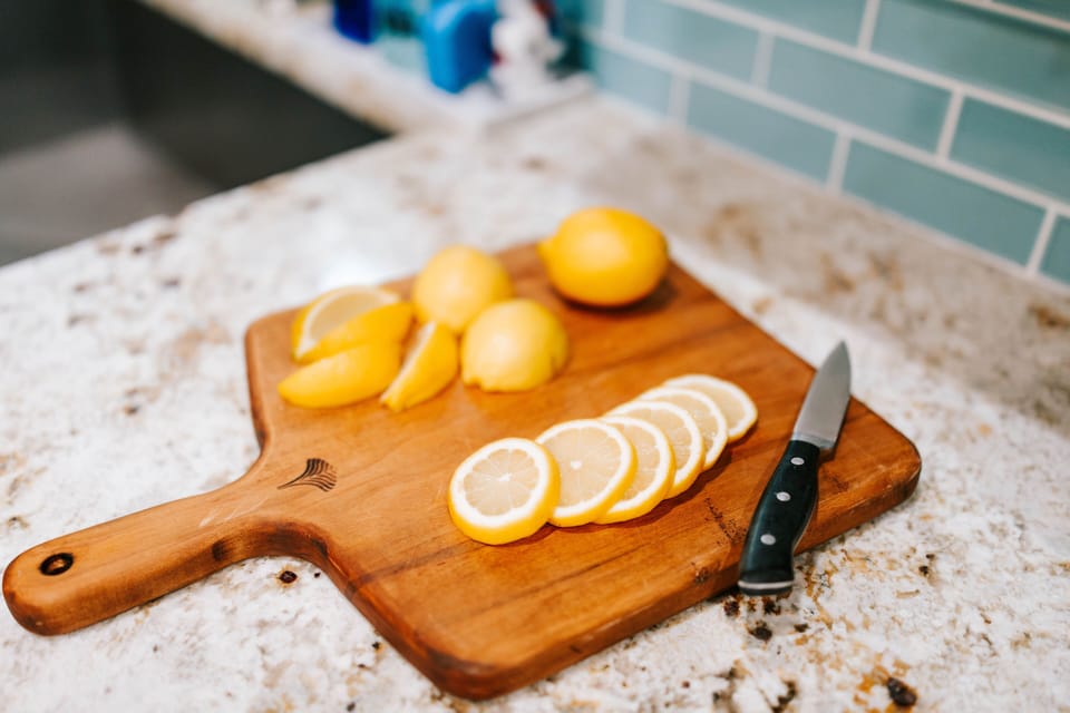 Fresh kitchen details with stone counters and a stylish prep space