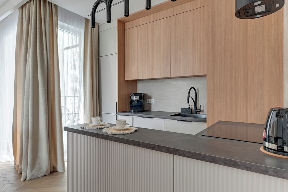 Deluxe Apartment, Balcony | 3 bedrooms, iron/ironing board, free WiFi