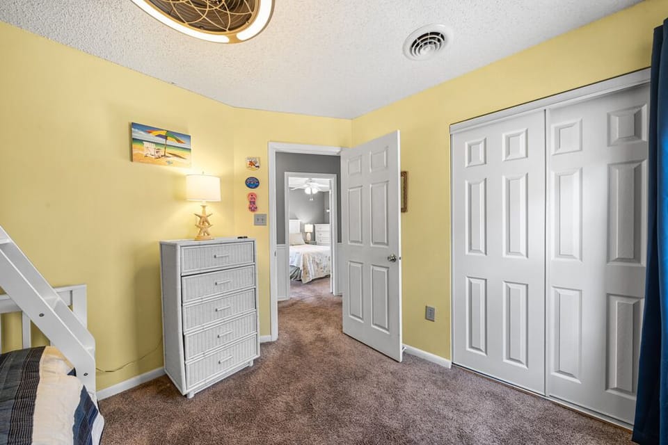 Twin-over-full bunk offering comfortable sleeping for multiple guests.
