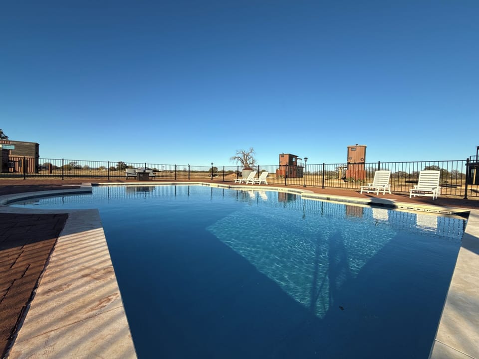 Peaceful pool views at Station on the Vines. Your relaxing wine-country stay, done right. 💦