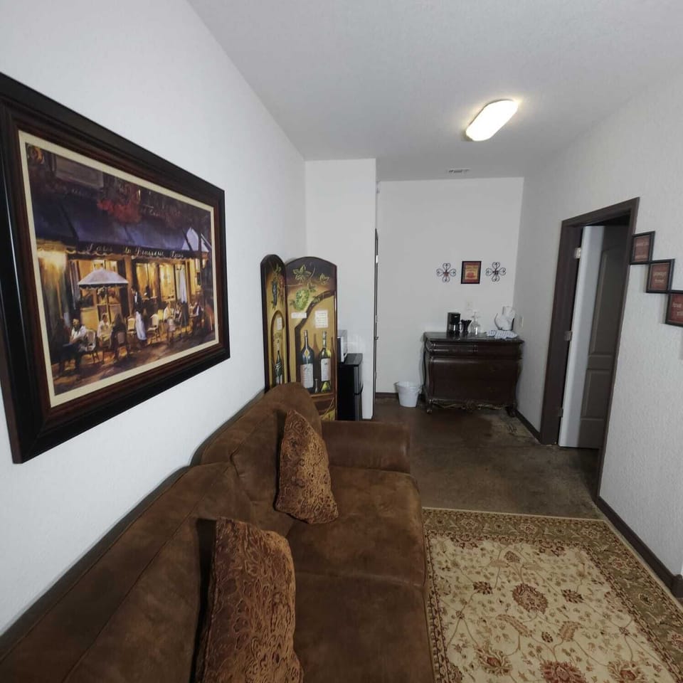 Living Room Retreat: Enjoy charming decor and a perfect spot to unwind after a day of adventure!