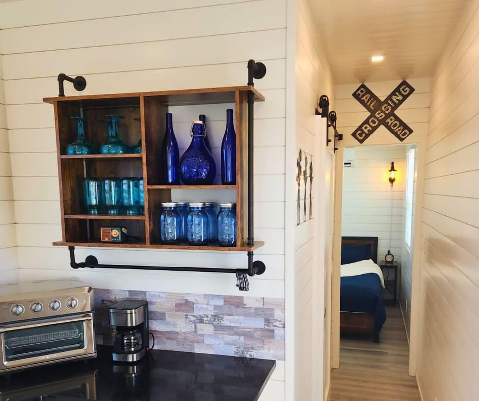 Kitchenette Charm: Vintage-inspired decor blends with modern amenities for perfect meal prep!