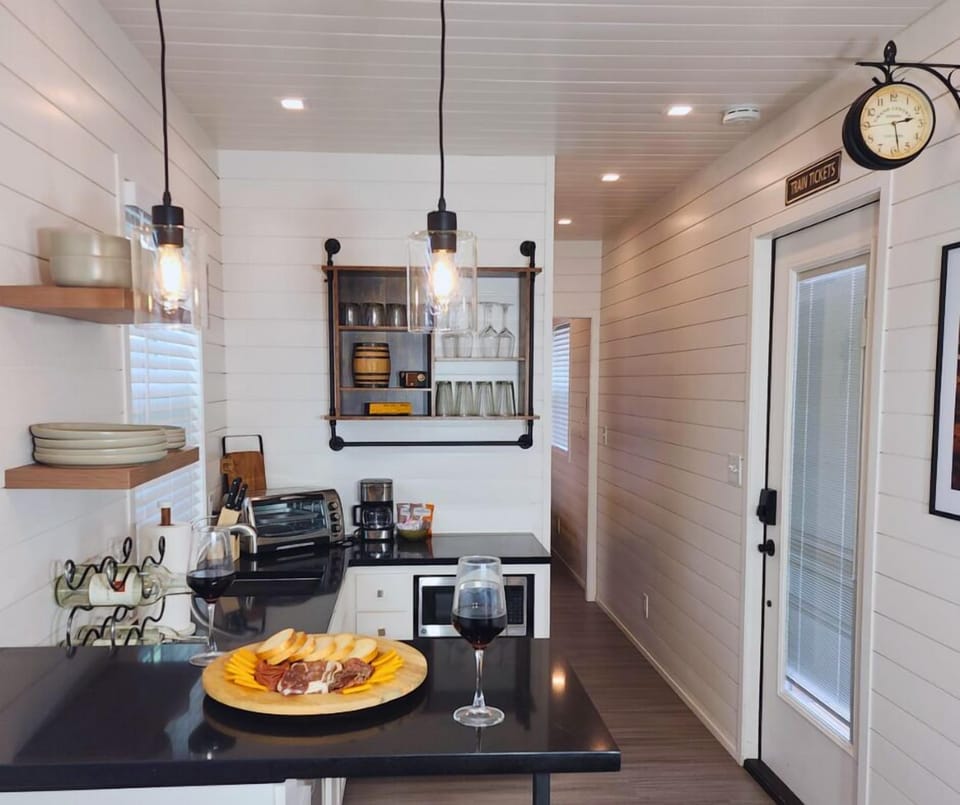 Kitchenette: Sleek surfaces and warm lighting create the perfect backdrop for culinary adventures!
