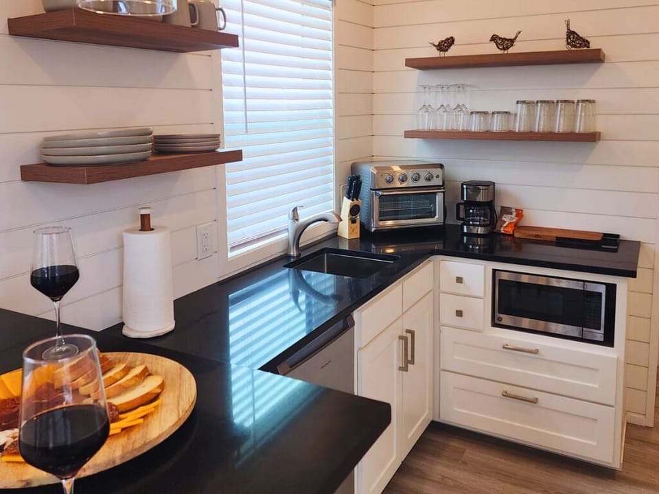 Gourmet Kitchen: Whip up culinary delights with sleek appliances and modern finishes!