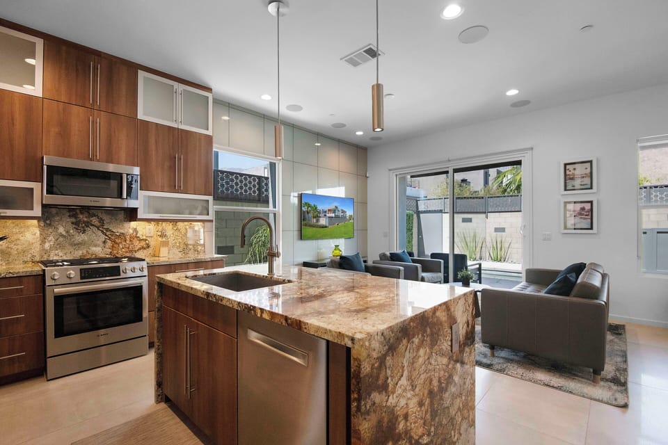 Gourmet kitchen with oversized island and modern finishes