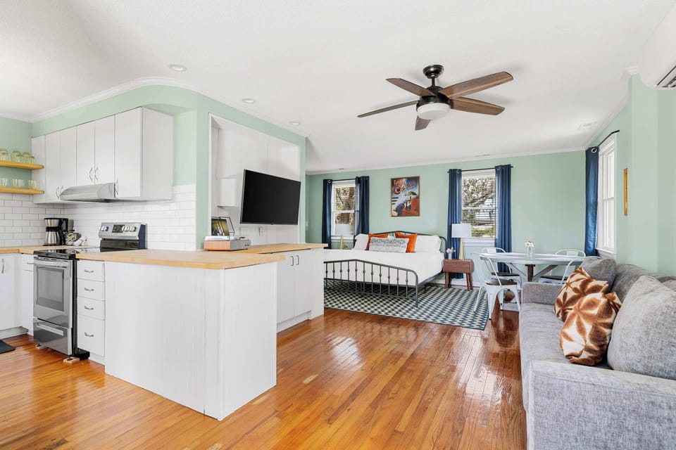 Enjoy an open-concept retreat with a full kitchen, plush king bed, and pullout sofa for extra guests.