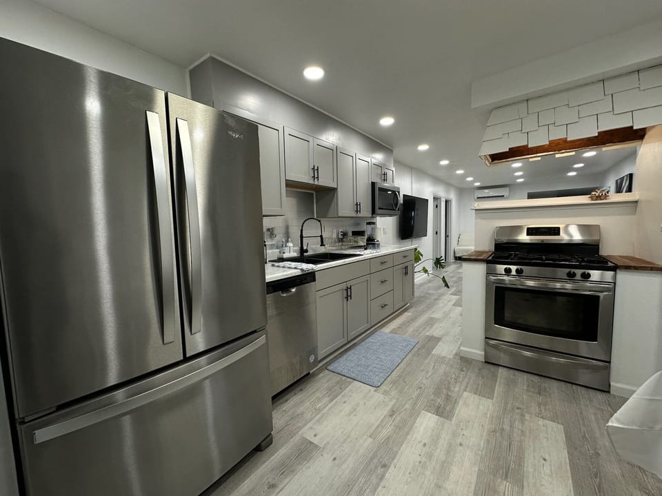 Enter the house into the kitchen