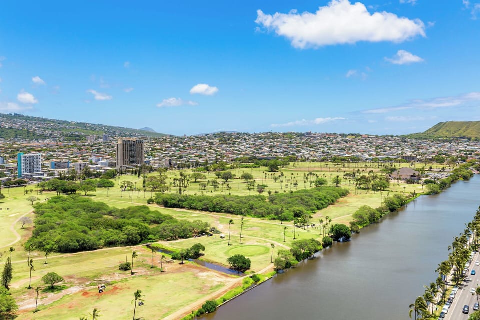 Enjoy stunning views of Ala Wai and the majestic mountains